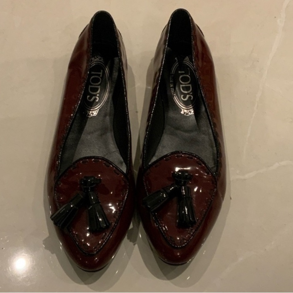Tod’s Shiny Burgundy Flats